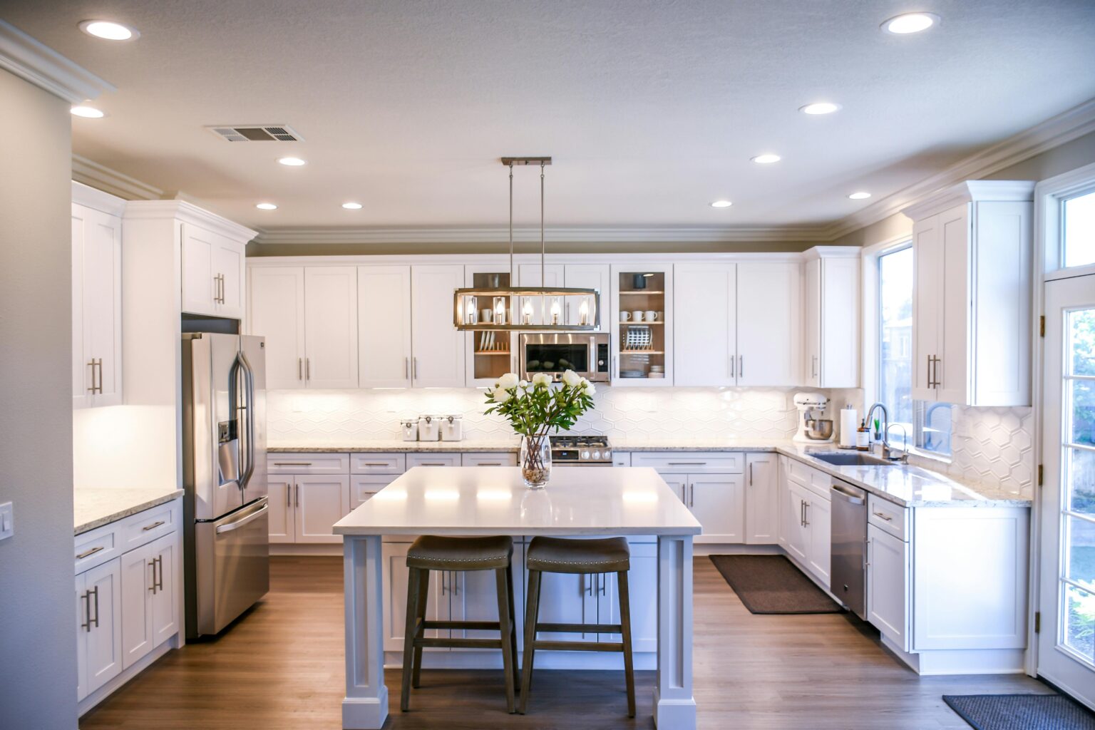 Home Remodeling in Dublin 32 The best kitchen remodeling in Alameda. Modern white cabinets with new appliances and a central island. Home remodeling in Dublin