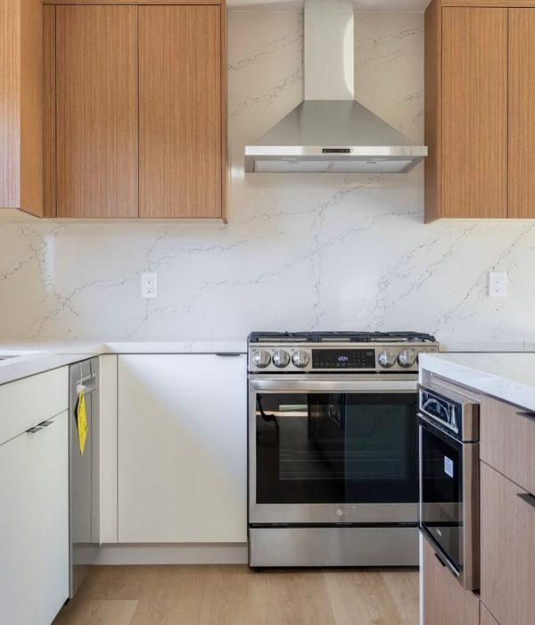 Kitchen Remodel 59 Kitchen with honey colored cabinets and modern appliances