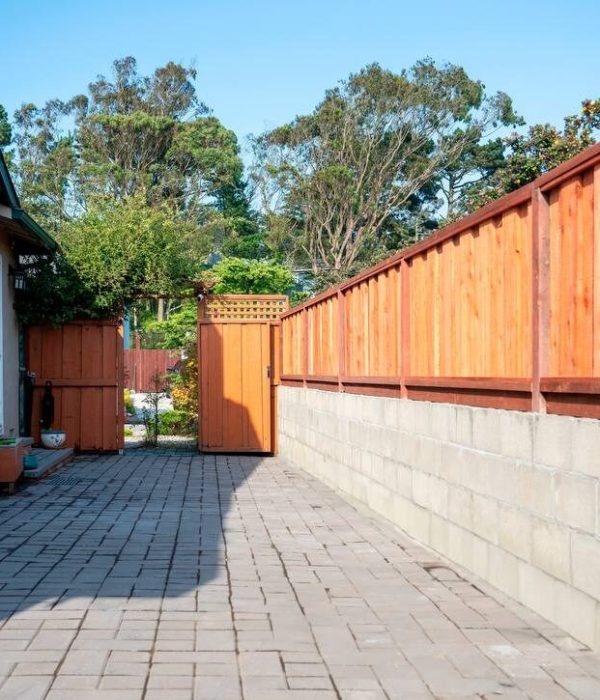 Retaining Wall – Rui Lee 31 Retaining wall and pavers installation in Martinez. Wood fencing installed over a block retaining wall, creating a beautiful pathway. Retaining walls in Oakland