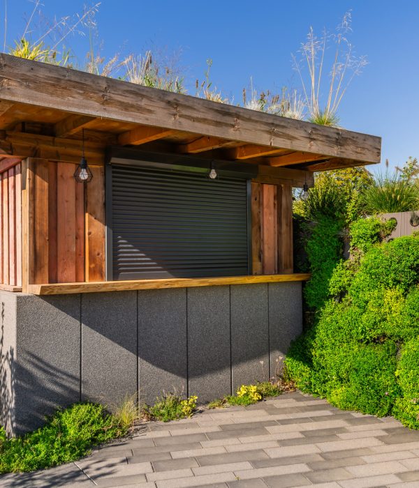 ADU Builder 45 Garden shed with green roofing and vertical garden, green roofing concept
