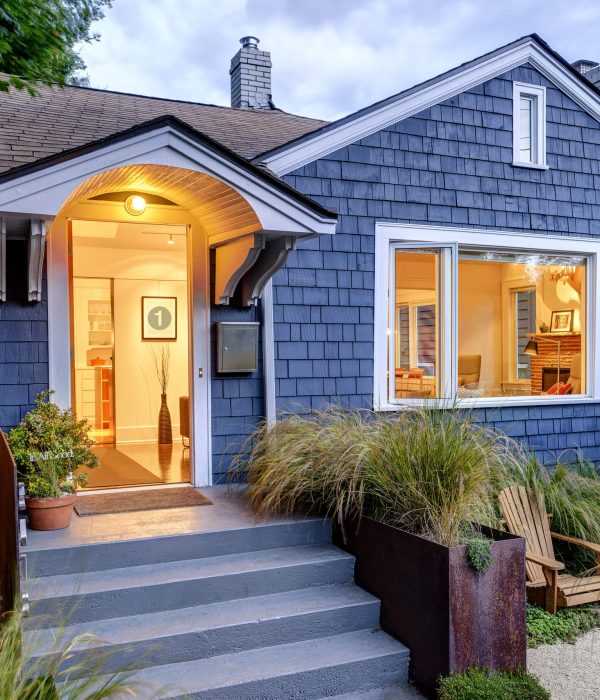 ADU Builder 51 Illuminated front stoop and of blue house