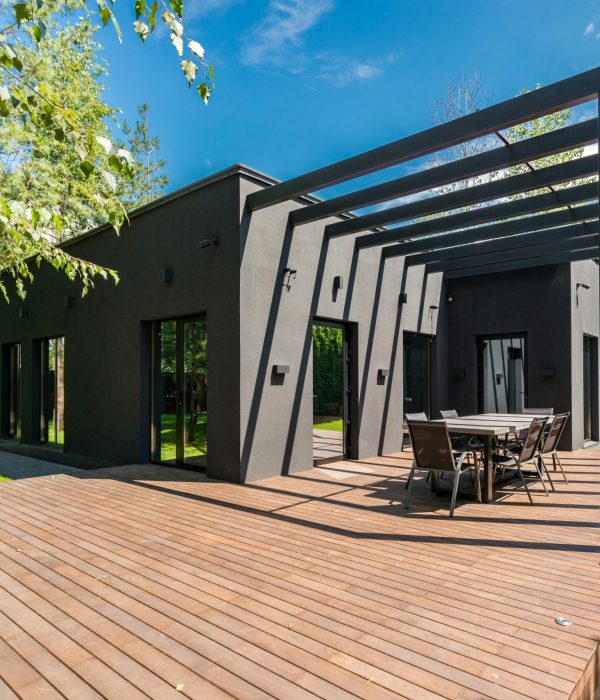 Deck Builder 43 a house with a table and chairs on a deck. Geico Builders, the #1 ADU builder in Hayward